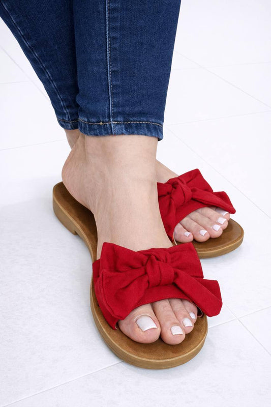 Sandalia plana tipo slide